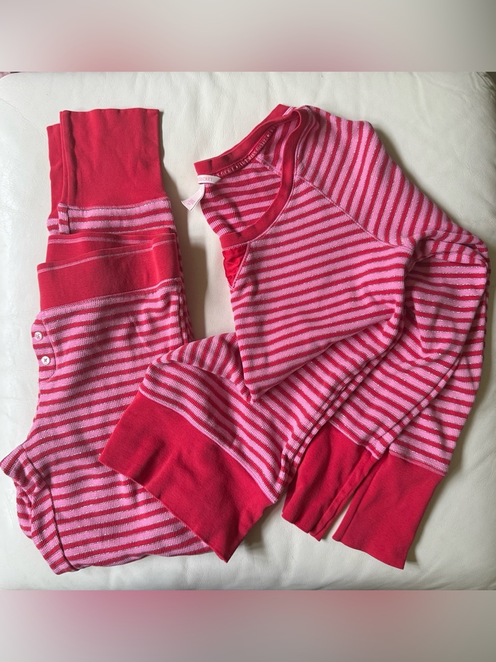 Victoria’s Secret PJ sat in pink, red and silver thread that sparkles.S/P